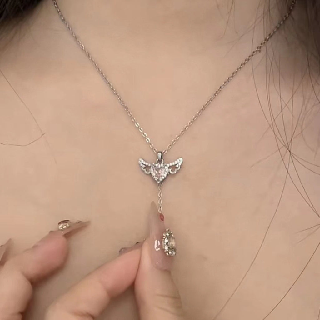 Jexyna Winged Heart Pendant — gold-plated cubic zirconia necklace (view 4)